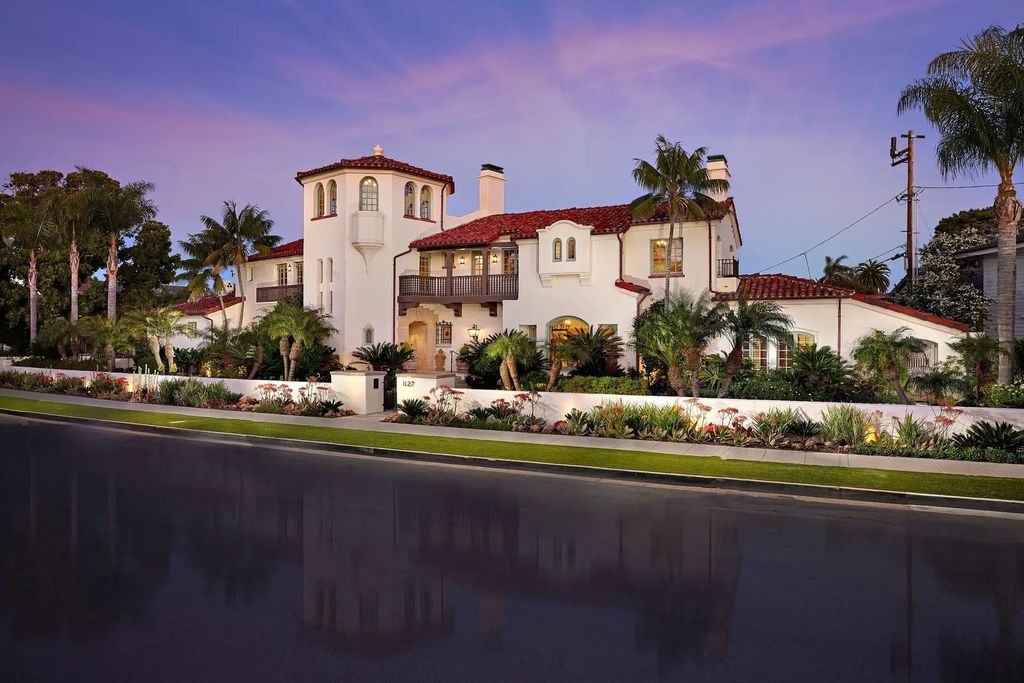 The Estate in Coronado, a historical landmark sits on a palm-lined promenade offering state-of-the-art amenities for optimal luxury living space, 100-year-old rustic olive trees, three fountains, a putting green, secret garden is now available for sale. This home located at 1127 F Ave, Coronado, California