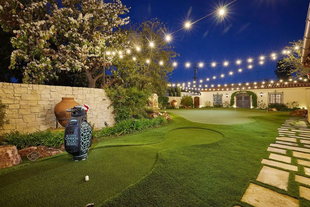 The Estate in Coronado, a historical landmark sits on a palm-lined promenade offering state-of-the-art amenities for optimal luxury living space, 100-year-old rustic olive trees, three fountains, a putting green, secret garden is now available for sale. This home located at 1127 F Ave, Coronado, California