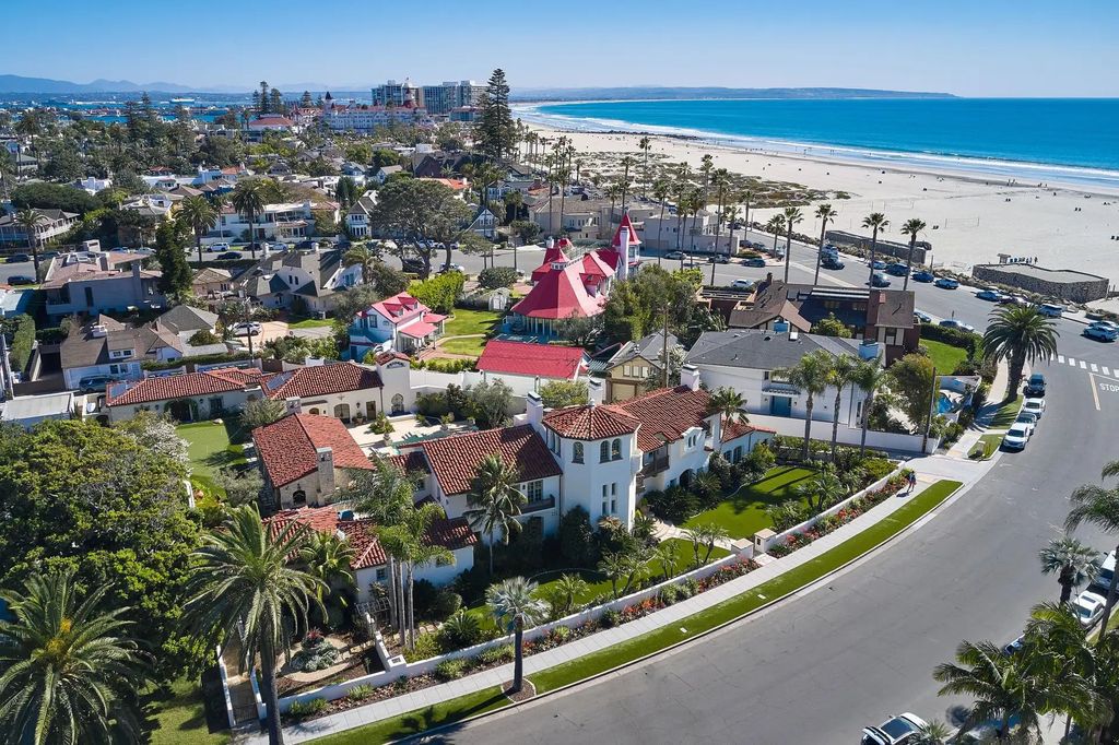 The Estate in Coronado, a historical landmark sits on a palm-lined promenade offering state-of-the-art amenities for optimal luxury living space, 100-year-old rustic olive trees, three fountains, a putting green, secret garden is now available for sale. This home located at 1127 F Ave, Coronado, California