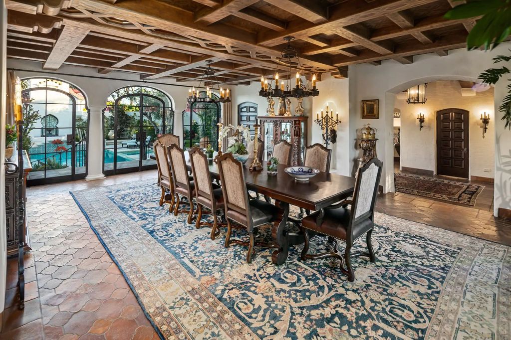 The Estate in Coronado, a historical landmark sits on a palm-lined promenade offering state-of-the-art amenities for optimal luxury living space, 100-year-old rustic olive trees, three fountains, a putting green, secret garden is now available for sale. This home located at 1127 F Ave, Coronado, California