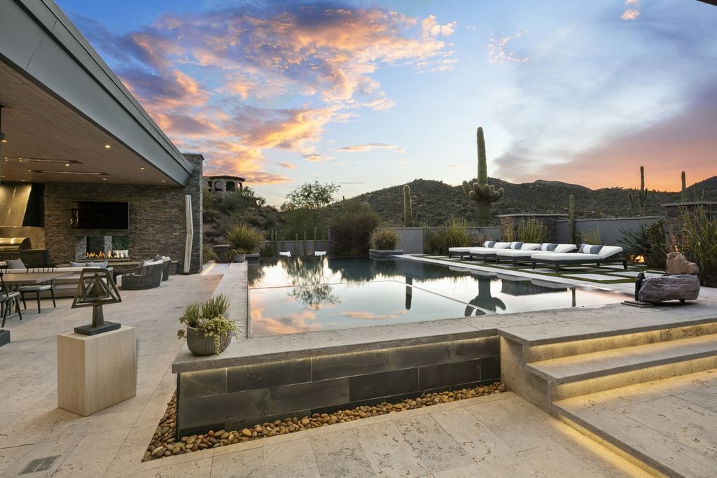The Home in Scottsdale, a Simply stunning contemporary masterpiece in Saguaro Forest thoughtfully sited on 2.5 acre lot for privacy and striking mountain views is now available for sale. This home located at 9716 E Mariola Way, Scottsdale, Arizona