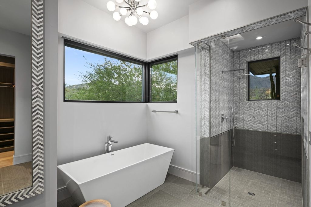 The Home in Scottsdale, a Simply stunning contemporary masterpiece in Saguaro Forest thoughtfully sited on 2.5 acre lot for privacy and striking mountain views is now available for sale. This home located at 9716 E Mariola Way, Scottsdale, Arizona