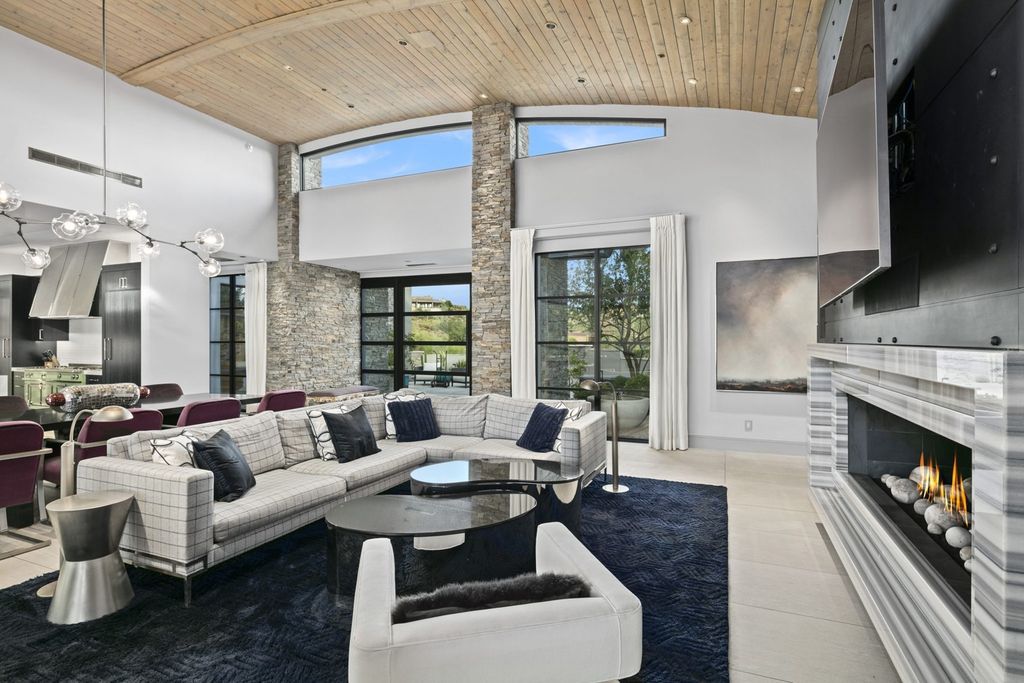 The Home in Scottsdale, a Simply stunning contemporary masterpiece in Saguaro Forest thoughtfully sited on 2.5 acre lot for privacy and striking mountain views is now available for sale. This home located at 9716 E Mariola Way, Scottsdale, Arizona