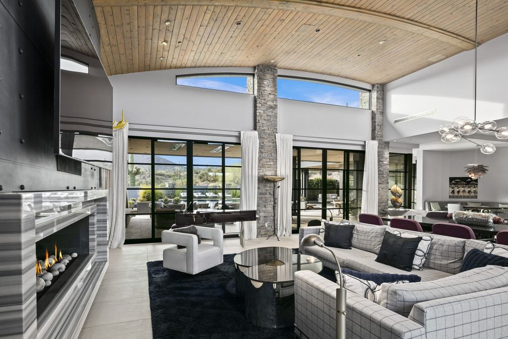 The Home in Scottsdale, a Simply stunning contemporary masterpiece in Saguaro Forest thoughtfully sited on 2.5 acre lot for privacy and striking mountain views is now available for sale. This home located at 9716 E Mariola Way, Scottsdale, Arizona