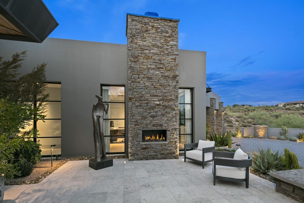 The Home in Scottsdale, a Simply stunning contemporary masterpiece in Saguaro Forest thoughtfully sited on 2.5 acre lot for privacy and striking mountain views is now available for sale. This home located at 9716 E Mariola Way, Scottsdale, Arizona