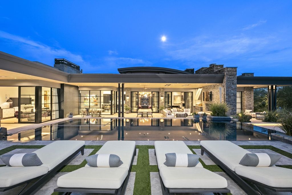 The Home in Scottsdale, a Simply stunning contemporary masterpiece in Saguaro Forest thoughtfully sited on 2.5 acre lot for privacy and striking mountain views is now available for sale. This home located at 9716 E Mariola Way, Scottsdale, Arizona