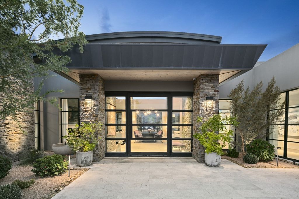 The Home in Scottsdale, a Simply stunning contemporary masterpiece in Saguaro Forest thoughtfully sited on 2.5 acre lot for privacy and striking mountain views is now available for sale. This home located at 9716 E Mariola Way, Scottsdale, Arizona