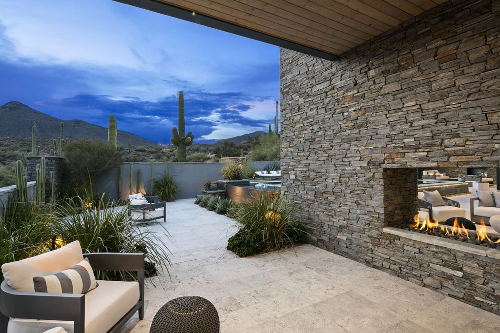 The Home in Scottsdale, a Simply stunning contemporary masterpiece in Saguaro Forest thoughtfully sited on 2.5 acre lot for privacy and striking mountain views is now available for sale. This home located at 9716 E Mariola Way, Scottsdale, Arizona