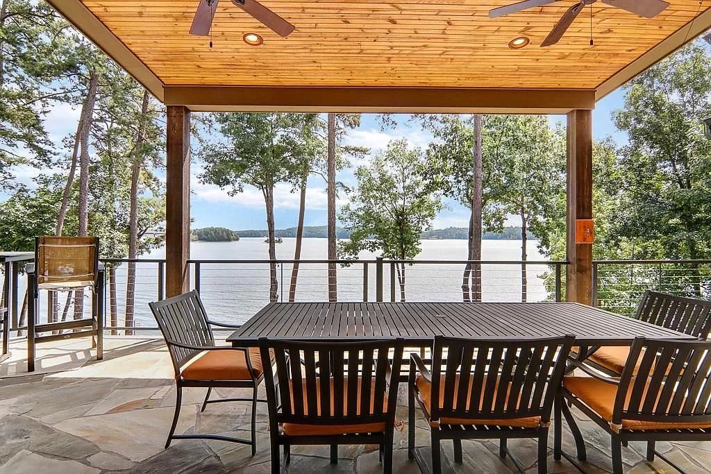 The Estate in Seneca is a luxurious home featuring ample space and fluent design for countless entertaining now available for sale. This home located at 319 Greentree Ct, Seneca, South Carolina; offering 04 bedrooms and 06 bathrooms with 5,296 square feet of living spaces. 