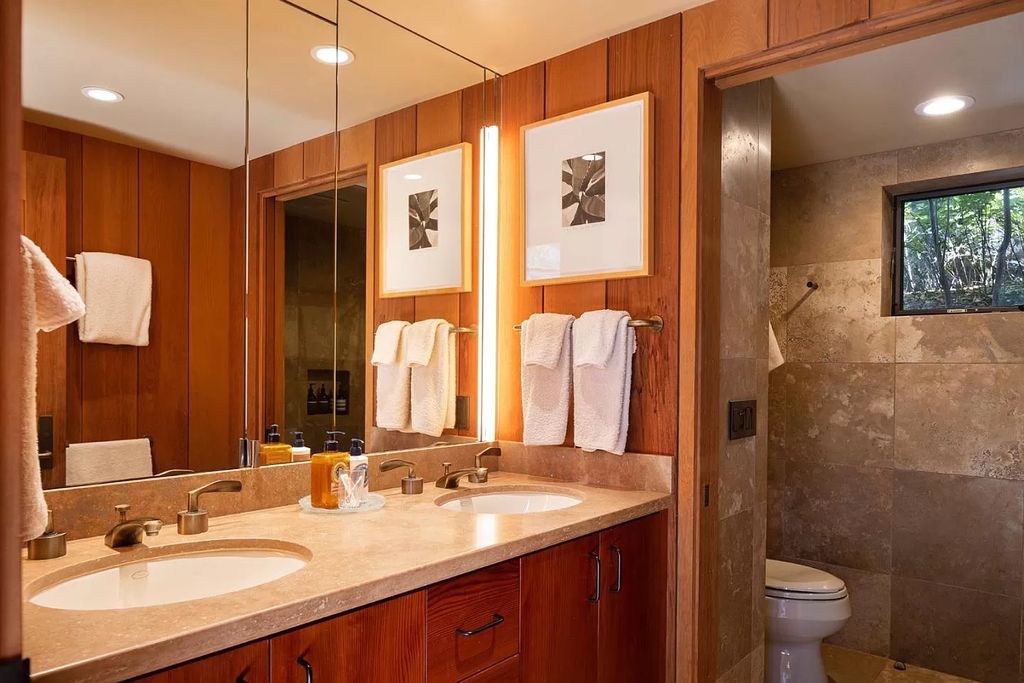 The Home in Carmel Valley, a modern compound designed by David Allen Smith with organic materials throughout, massive glass windows, and a voluminous interior is now available for sale. This home located at 49 Encina Dr, Carmel Valley, California