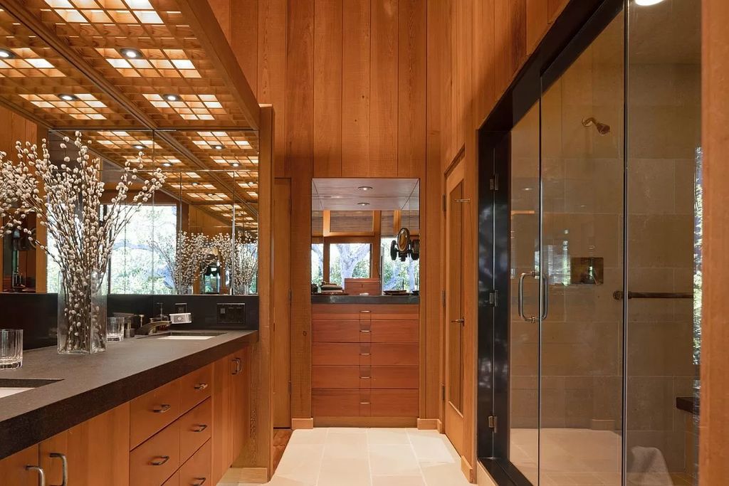 The Home in Carmel Valley, a modern compound designed by David Allen Smith with organic materials throughout, massive glass windows, and a voluminous interior is now available for sale. This home located at 49 Encina Dr, Carmel Valley, California