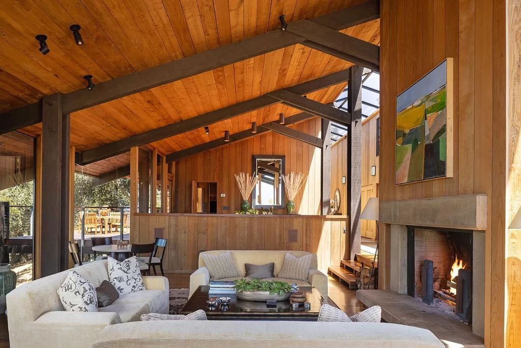 The Home in Carmel Valley, a modern compound designed by David Allen Smith with organic materials throughout, massive glass windows, and a voluminous interior is now available for sale. This home located at 49 Encina Dr, Carmel Valley, California