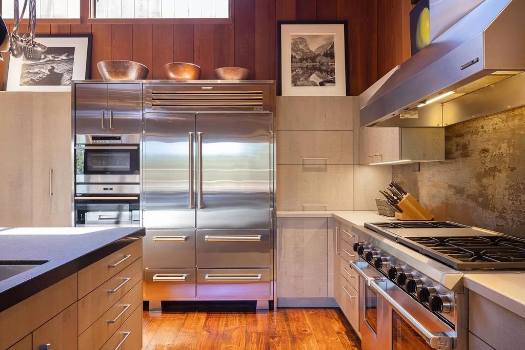 The Home in Carmel Valley, a modern compound designed by David Allen Smith with organic materials throughout, massive glass windows, and a voluminous interior is now available for sale. This home located at 49 Encina Dr, Carmel Valley, California