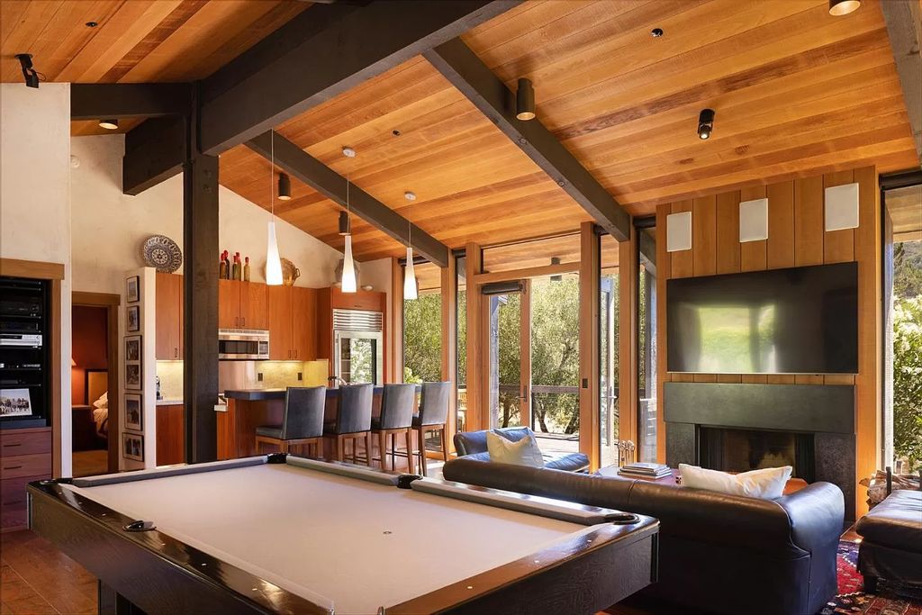 The Home in Carmel Valley, a modern compound designed by David Allen Smith with organic materials throughout, massive glass windows, and a voluminous interior is now available for sale. This home located at 49 Encina Dr, Carmel Valley, California