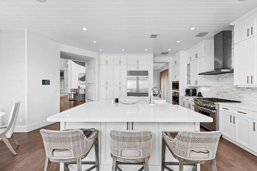 The Home in Boca Raton, a an impressive two-story residence masterfully designed for luxurious living and gracious entertaining on an oversized waterfront lot within the highly desirable community of Royal Palm Polo is now available for sale. This home located at 7305 NW 27th Ave, Boca Raton, Florida