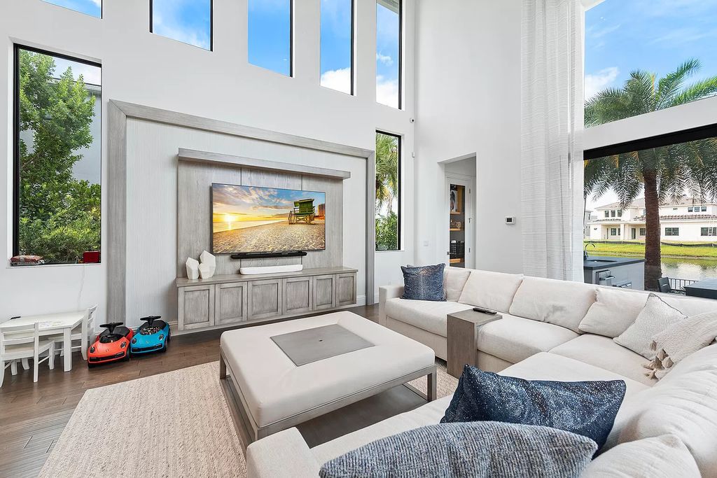 The Home in Boca Raton, a an impressive two-story residence masterfully designed for luxurious living and gracious entertaining on an oversized waterfront lot within the highly desirable community of Royal Palm Polo is now available for sale. This home located at 7305 NW 27th Ave, Boca Raton, Florida