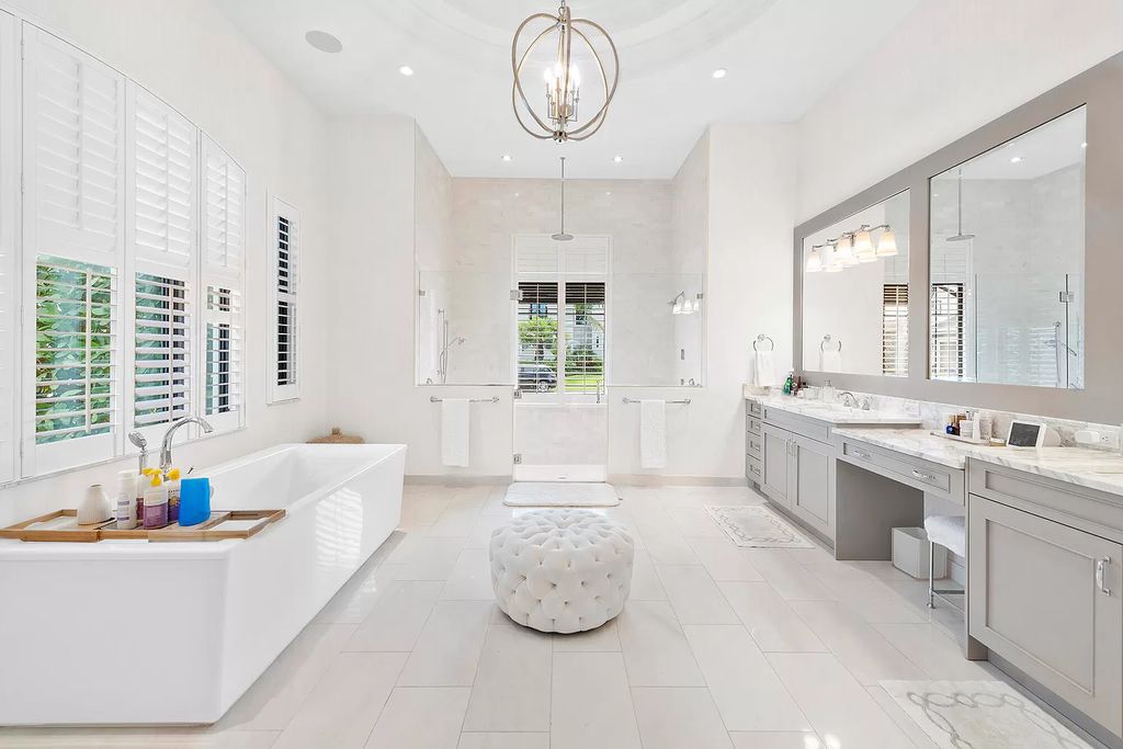 The Home in Boca Raton, a an impressive two-story residence masterfully designed for luxurious living and gracious entertaining on an oversized waterfront lot within the highly desirable community of Royal Palm Polo is now available for sale. This home located at 7305 NW 27th Ave, Boca Raton, Florida