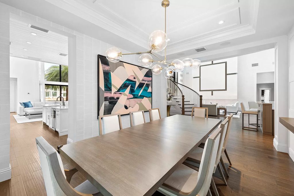 The Home in Boca Raton, a an impressive two-story residence masterfully designed for luxurious living and gracious entertaining on an oversized waterfront lot within the highly desirable community of Royal Palm Polo is now available for sale. This home located at 7305 NW 27th Ave, Boca Raton, Florida
