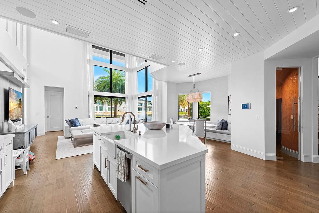 The Home in Boca Raton, a an impressive two-story residence masterfully designed for luxurious living and gracious entertaining on an oversized waterfront lot within the highly desirable community of Royal Palm Polo is now available for sale. This home located at 7305 NW 27th Ave, Boca Raton, Florida