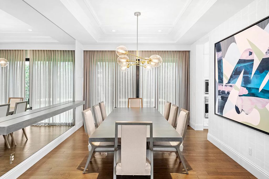 The Home in Boca Raton, a an impressive two-story residence masterfully designed for luxurious living and gracious entertaining on an oversized waterfront lot within the highly desirable community of Royal Palm Polo is now available for sale. This home located at 7305 NW 27th Ave, Boca Raton, Florida
