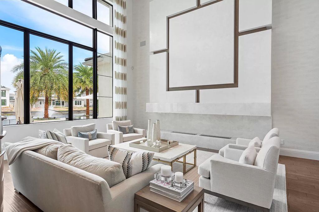 The Home in Boca Raton, a an impressive two-story residence masterfully designed for luxurious living and gracious entertaining on an oversized waterfront lot within the highly desirable community of Royal Palm Polo is now available for sale. This home located at 7305 NW 27th Ave, Boca Raton, Florida