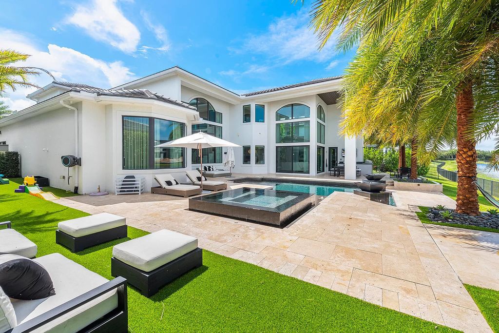 The Home in Boca Raton, a an impressive two-story residence masterfully designed for luxurious living and gracious entertaining on an oversized waterfront lot within the highly desirable community of Royal Palm Polo is now available for sale. This home located at 7305 NW 27th Ave, Boca Raton, Florida
