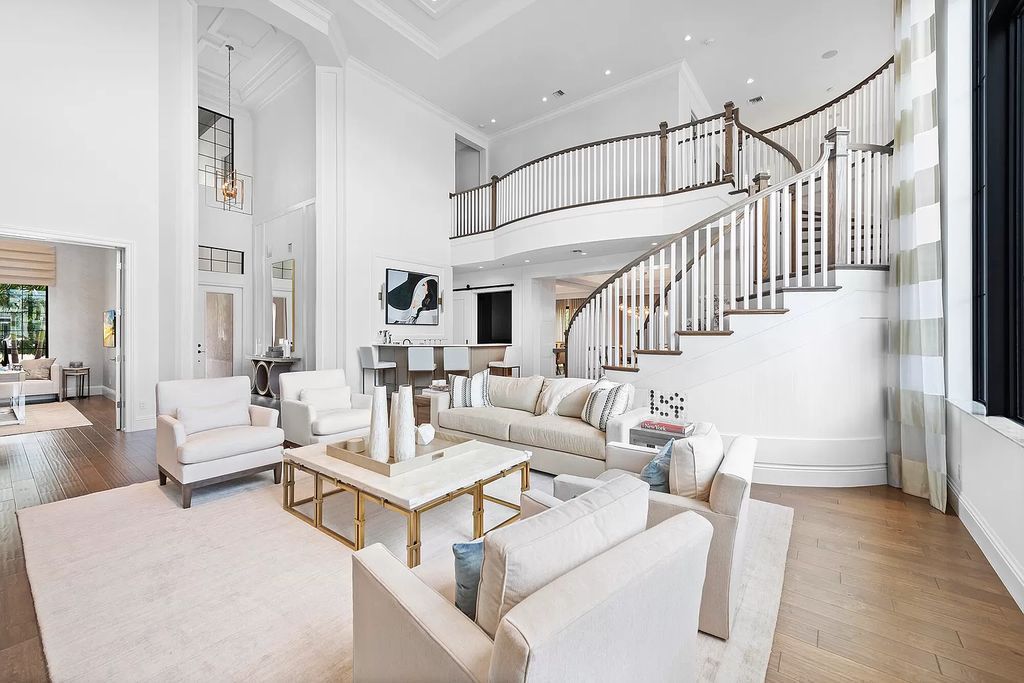 The Home in Boca Raton, a an impressive two-story residence masterfully designed for luxurious living and gracious entertaining on an oversized waterfront lot within the highly desirable community of Royal Palm Polo is now available for sale. This home located at 7305 NW 27th Ave, Boca Raton, Florida