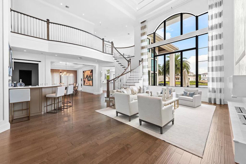 The Home in Boca Raton, a an impressive two-story residence masterfully designed for luxurious living and gracious entertaining on an oversized waterfront lot within the highly desirable community of Royal Palm Polo is now available for sale. This home located at 7305 NW 27th Ave, Boca Raton, Florida