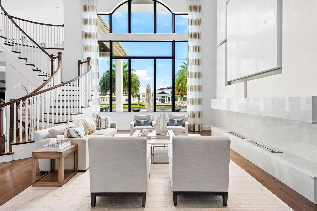 The Home in Boca Raton, a an impressive two-story residence masterfully designed for luxurious living and gracious entertaining on an oversized waterfront lot within the highly desirable community of Royal Palm Polo is now available for sale. This home located at 7305 NW 27th Ave, Boca Raton, Florida