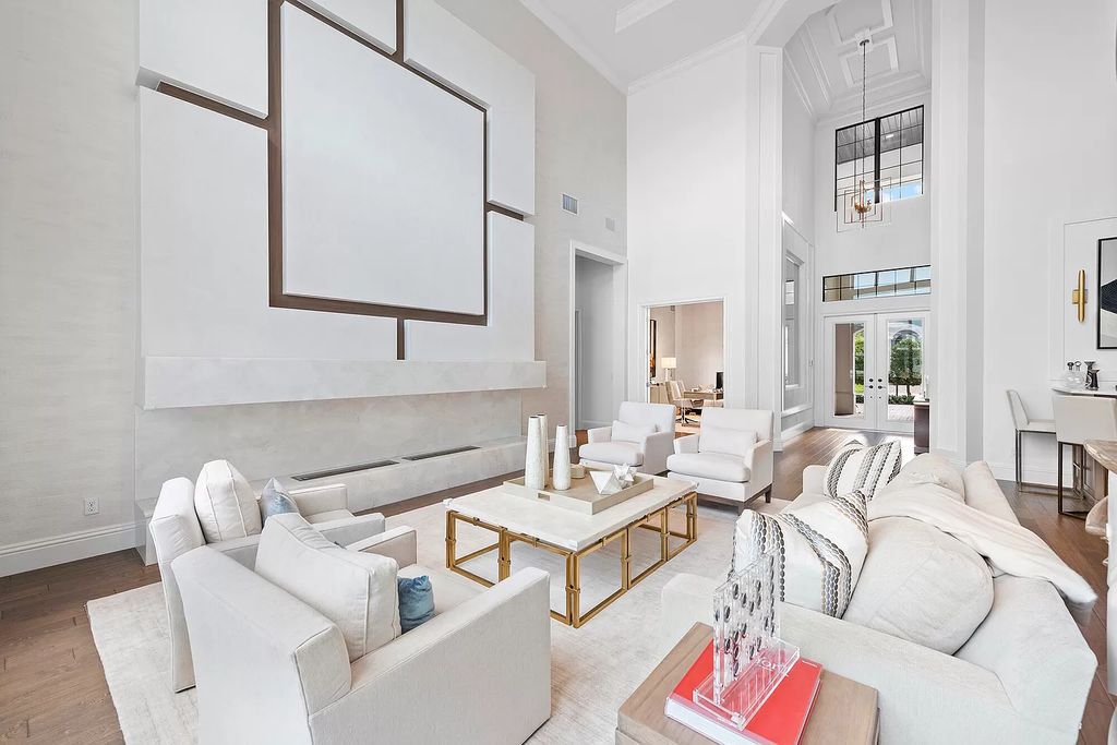 The Home in Boca Raton, a an impressive two-story residence masterfully designed for luxurious living and gracious entertaining on an oversized waterfront lot within the highly desirable community of Royal Palm Polo is now available for sale. This home located at 7305 NW 27th Ave, Boca Raton, Florida