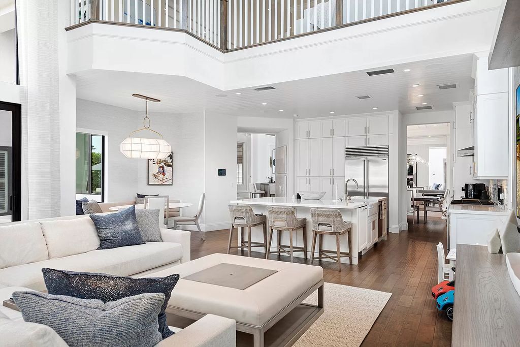 The Home in Boca Raton, a an impressive two-story residence masterfully designed for luxurious living and gracious entertaining on an oversized waterfront lot within the highly desirable community of Royal Palm Polo is now available for sale. This home located at 7305 NW 27th Ave, Boca Raton, Florida