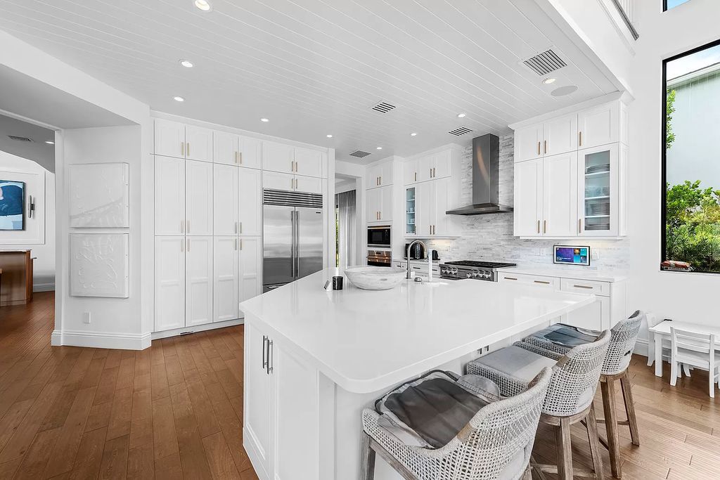 The Home in Boca Raton, a an impressive two-story residence masterfully designed for luxurious living and gracious entertaining on an oversized waterfront lot within the highly desirable community of Royal Palm Polo is now available for sale. This home located at 7305 NW 27th Ave, Boca Raton, Florida