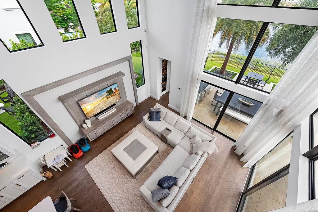 The Home in Boca Raton, a an impressive two-story residence masterfully designed for luxurious living and gracious entertaining on an oversized waterfront lot within the highly desirable community of Royal Palm Polo is now available for sale. This home located at 7305 NW 27th Ave, Boca Raton, Florida