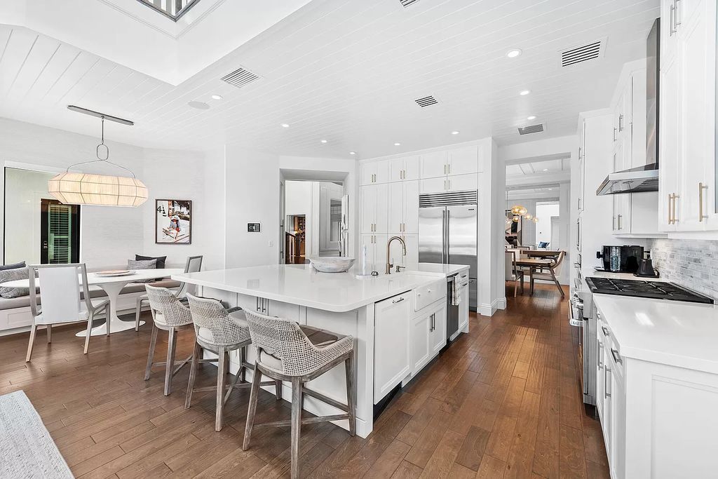 The Home in Boca Raton, a an impressive two-story residence masterfully designed for luxurious living and gracious entertaining on an oversized waterfront lot within the highly desirable community of Royal Palm Polo is now available for sale. This home located at 7305 NW 27th Ave, Boca Raton, Florida