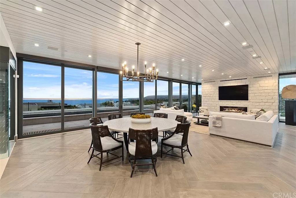 The Home in Dana Point, a contemporary masterpiece behind the guarded gates of The Strand at Headlands has a gorgeous backyard with panoramic Pacific views is now available for sale. This home located at 5 Pacific Ridge Pl, Dana Point, California