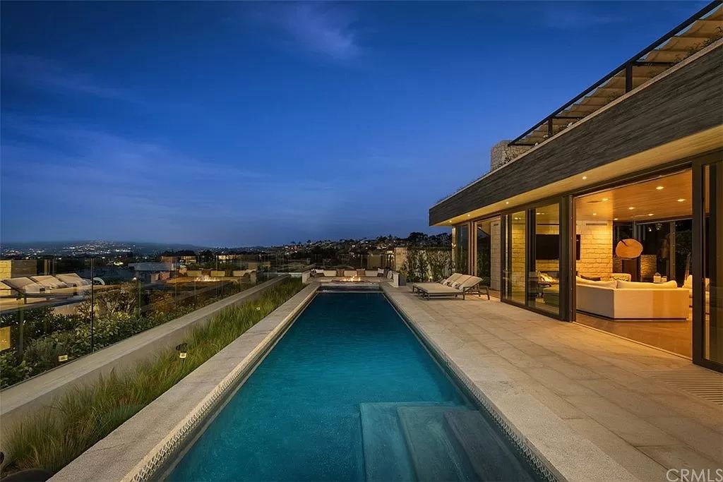 The Home in Dana Point, a contemporary masterpiece behind the guarded gates of The Strand at Headlands has a gorgeous backyard with panoramic Pacific views is now available for sale. This home located at 5 Pacific Ridge Pl, Dana Point, California