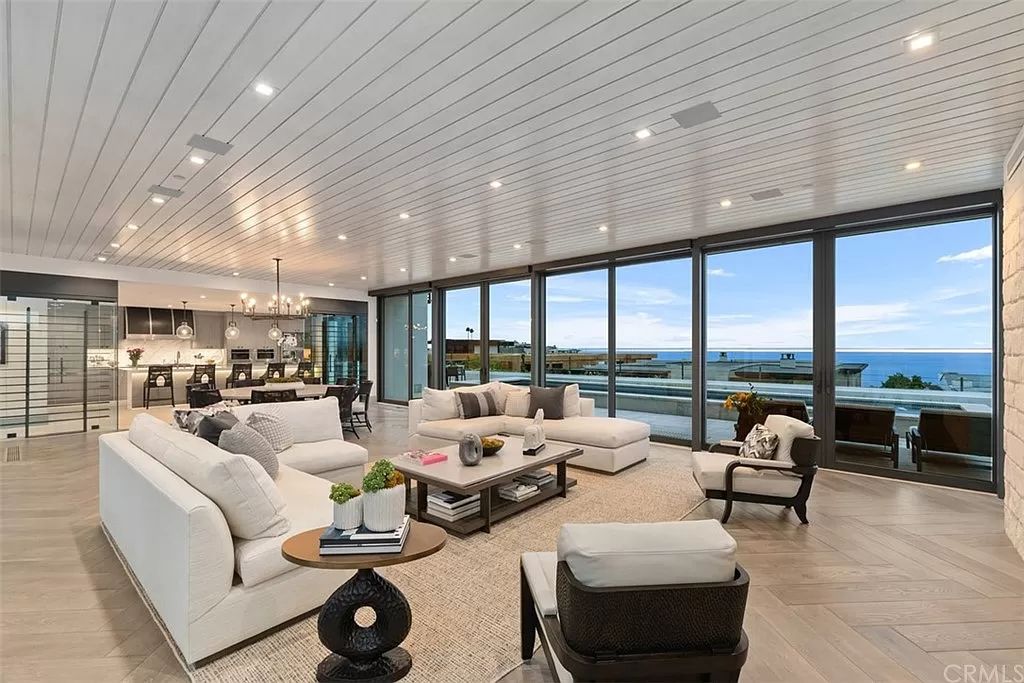 The Home in Dana Point, a contemporary masterpiece behind the guarded gates of The Strand at Headlands has a gorgeous backyard with panoramic Pacific views is now available for sale. This home located at 5 Pacific Ridge Pl, Dana Point, California