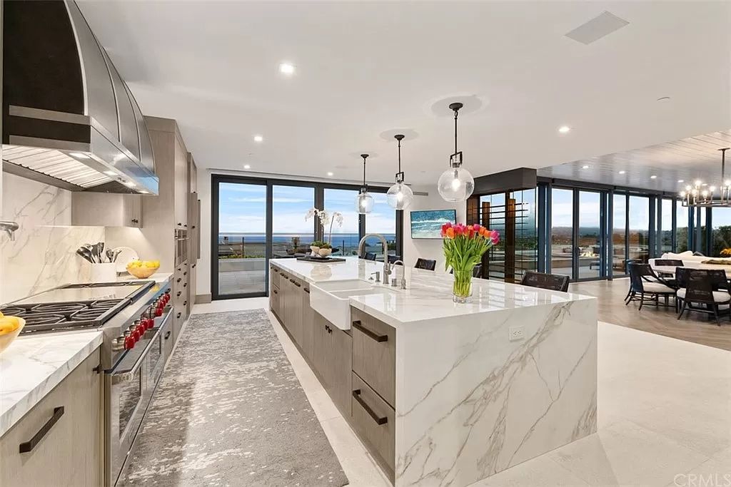 The Home in Dana Point, a contemporary masterpiece behind the guarded gates of The Strand at Headlands has a gorgeous backyard with panoramic Pacific views is now available for sale. This home located at 5 Pacific Ridge Pl, Dana Point, California