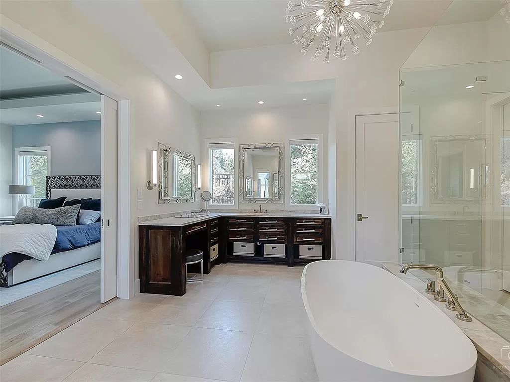 The Home in Westlake, a transitional style estate with clean lines, stunning steel, glass doors throughout, Ipe wood accents and spacious outdoor entertaining is now available for sale. This home located at 1714 Post Oak Pl, Westlake, Texas