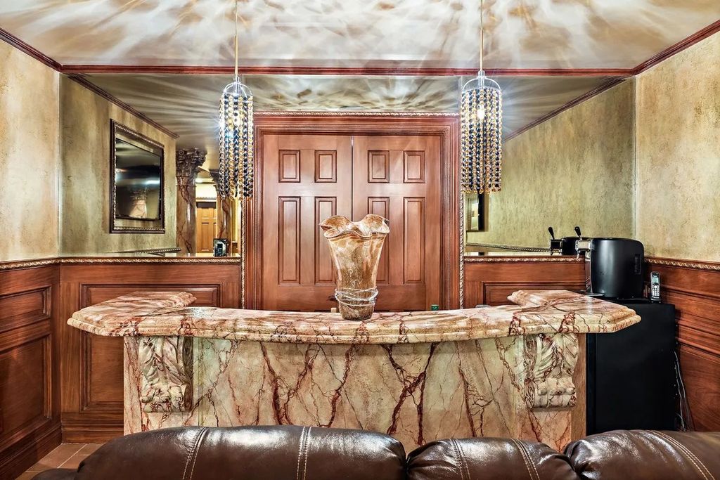 The Estate in Marlboro is a luxurious home with luxurious Eastern European design exuding excellence in architecture and craftsmanship now available for sale. This home located at 101 School Road, Marlboro, New Jersey; offering 06 bedrooms and 09 bathrooms with 1.87 acres of land.