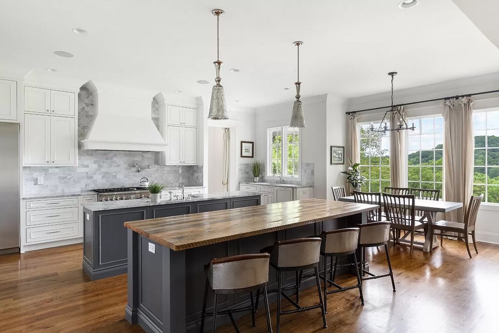 The Estate in Nashville features expansive living inclusive of chef’s kitchen, formal and informal entertainment spaces, now available for sale. This home located at 1609 Otter Creek Rd, Nashville, Tennessee