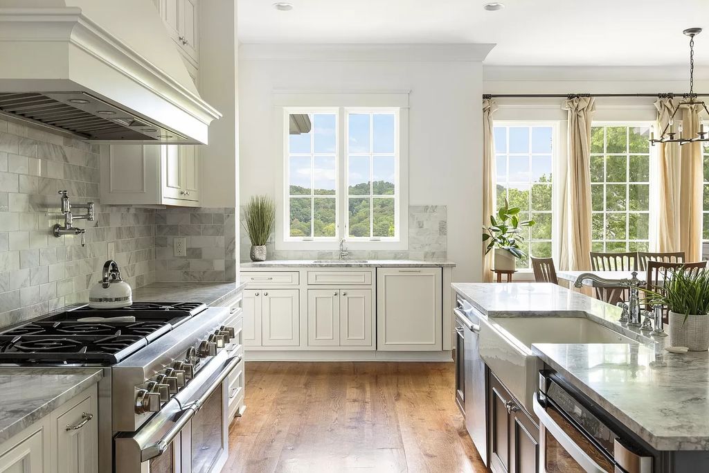 The Estate in Nashville features expansive living inclusive of chef’s kitchen, formal and informal entertainment spaces, now available for sale. This home located at 1609 Otter Creek Rd, Nashville, Tennessee
