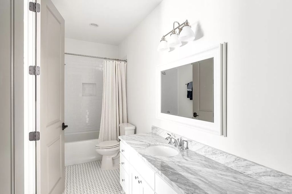 The Estate in Nashville features expansive living inclusive of chef’s kitchen, formal and informal entertainment spaces, now available for sale. This home located at 1609 Otter Creek Rd, Nashville, Tennessee