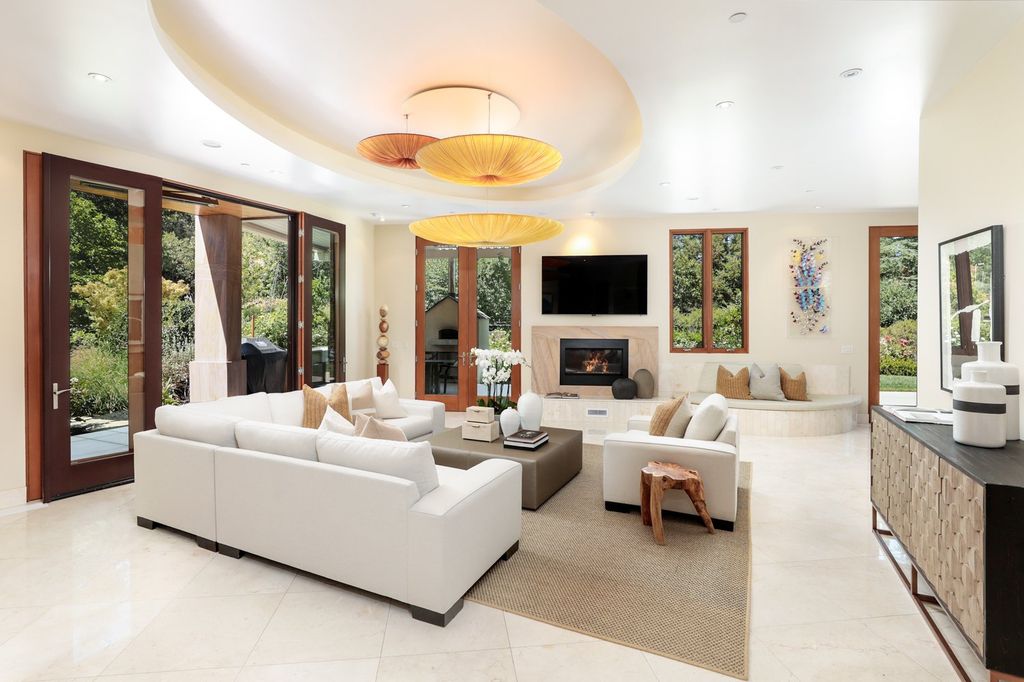 The Home in Los Altos Hills, an unparalleled estate was built with 5-star designer appointments inside and out and no straight angles to maximize California lifestyle is now available for sale. This house located at 12921 Tripoli Ct, Los Altos Hills, California