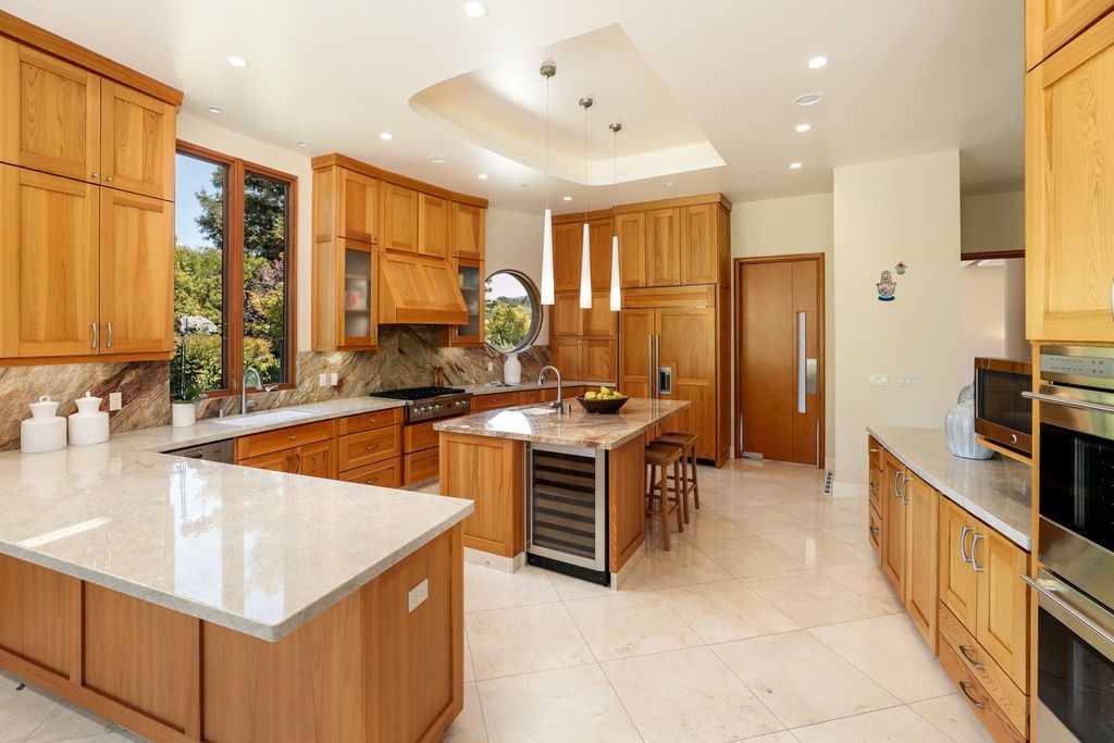 The Home in Los Altos Hills, an unparalleled estate was built with 5-star designer appointments inside and out and no straight angles to maximize California lifestyle is now available for sale. This house located at 12921 Tripoli Ct, Los Altos Hills, California