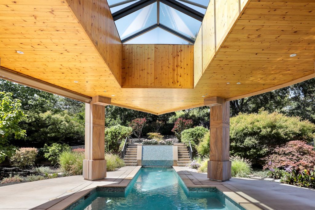 The Home in Los Altos Hills, an unparalleled estate was built with 5-star designer appointments inside and out and no straight angles to maximize California lifestyle is now available for sale. This house located at 12921 Tripoli Ct, Los Altos Hills, California