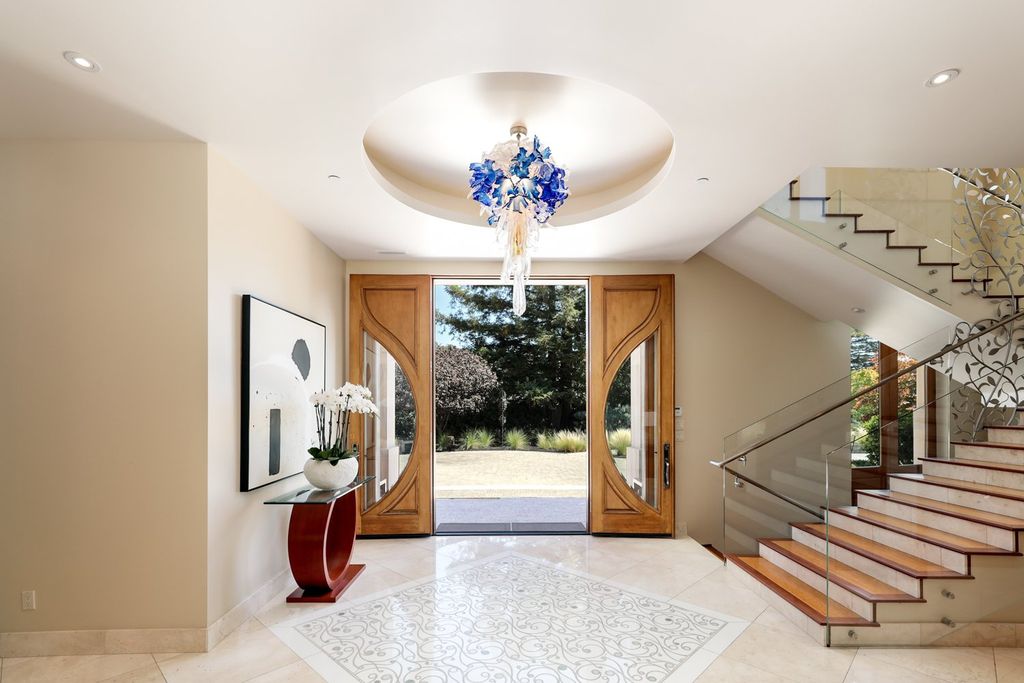 The Home in Los Altos Hills, an unparalleled estate was built with 5-star designer appointments inside and out and no straight angles to maximize California lifestyle is now available for sale. This house located at 12921 Tripoli Ct, Los Altos Hills, California