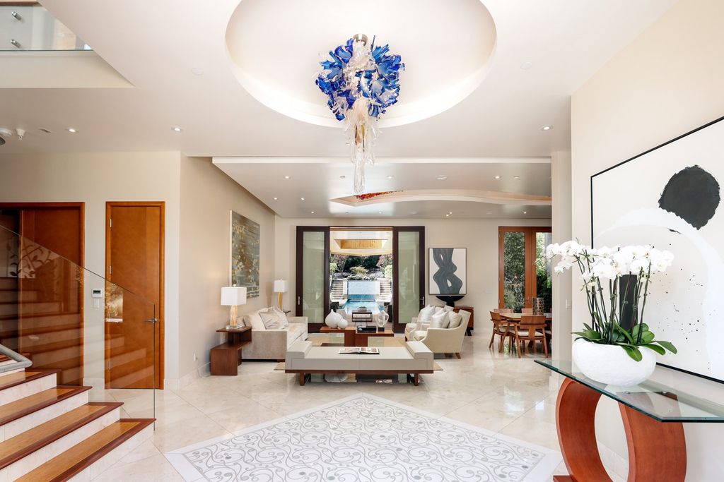 The Home in Los Altos Hills, an unparalleled estate was built with 5-star designer appointments inside and out and no straight angles to maximize California lifestyle is now available for sale. This house located at 12921 Tripoli Ct, Los Altos Hills, California
