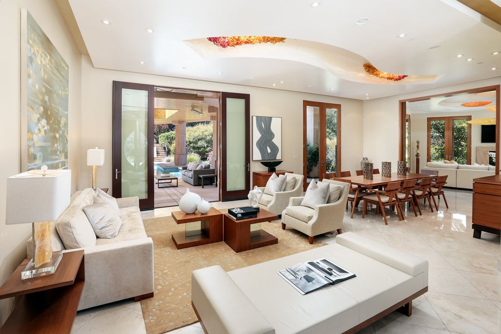 The Home in Los Altos Hills, an unparalleled estate was built with 5-star designer appointments inside and out and no straight angles to maximize California lifestyle is now available for sale. This house located at 12921 Tripoli Ct, Los Altos Hills, California