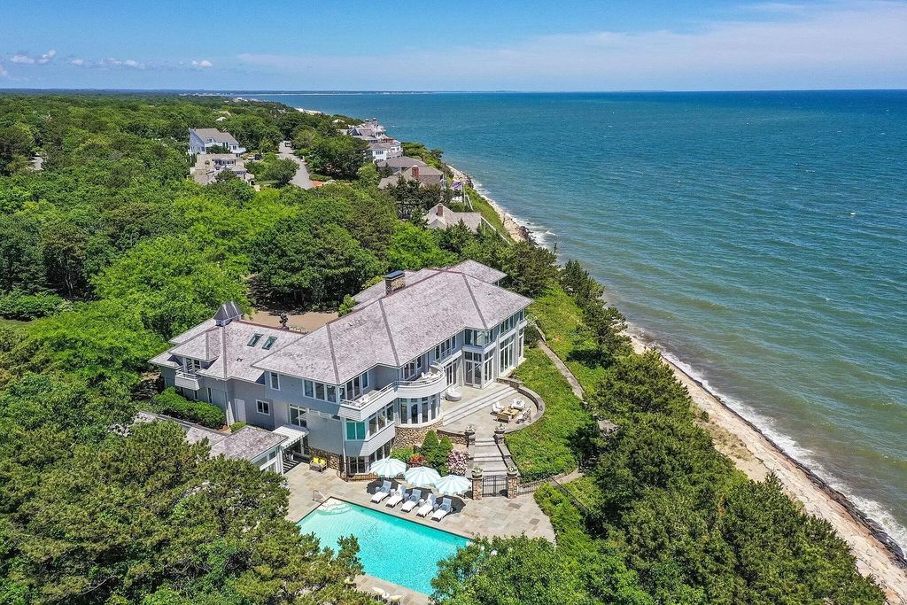 The Estate in Mashpee boasts every imaginable amenity for any occasion and total privacy with a breathtaking backdrop, now available for sale. This home located at 78 Triton Way, Mashpee, Massachusetts
